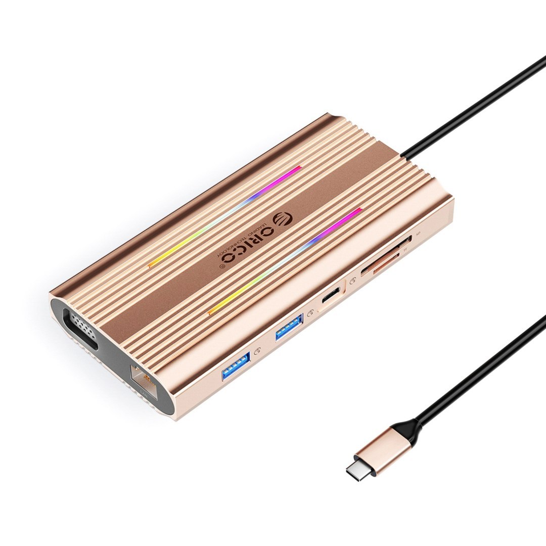Stacja dokująca HUB 12w1 USB-C – USB-A USB-C HDMI VGA RJ45 SD PD 100W 4K 1000Mbps RGB – różowo złota Stacja dokująca HUB 12w1 USB-C – USB-A USB-C HDMI VGA RJ45 SD PD 100W 4K 1000Mbps RGB – różowo złota
